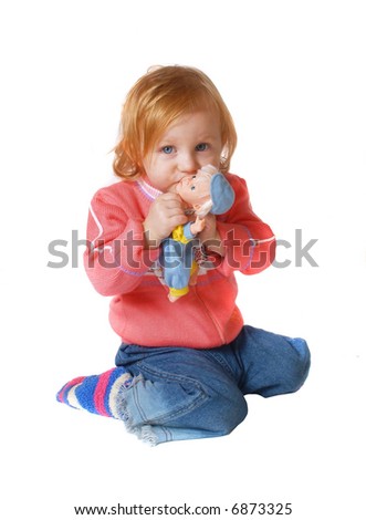 little girl  with toy isolated on white