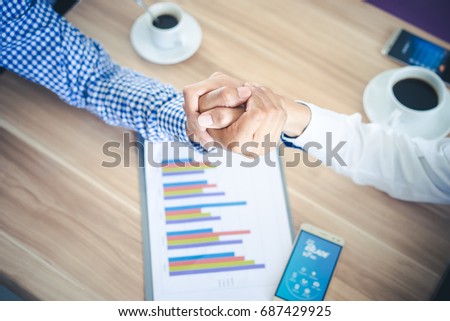 Top View Two Businessman Shaking Hands or Arm Wrestling, cooperative and teamwork concept,corporate life style,Cooperation initiative achievement