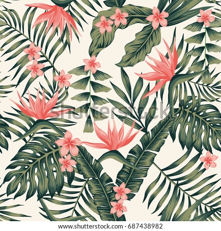 Beach cheerful seamless pattern wallpaper of tropical dark green leaves of palm trees and flowers bird of paradise (strelitzia) plumeria on a light yellow background Royalty-Free Stock Photo #687438982