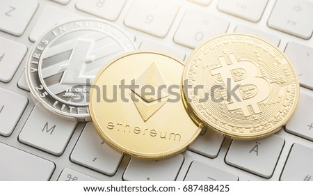 cryptocurrency coins - Litecoin, Bitcoin, Ethereum Royalty-Free Stock Photo #687488425
