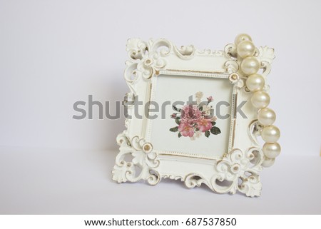 Picture frame and bracelet
