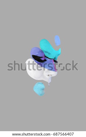 Creative makeup. Conceptual idea of bold body art painting. Abstract picture isolated on gray on woman face.
