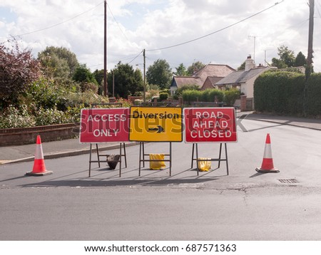 road works road blocked signs and traffic cones diversion access only; Essex; UK