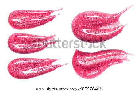 Set of different lip glosses smear isolated on white. Smudged makeup product sample. Royalty-Free Stock Photo #687578401