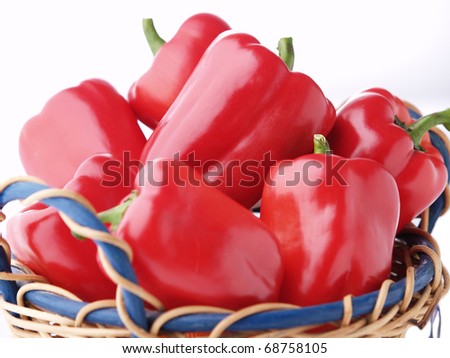 Closeup Of Red Paprikas On White Background