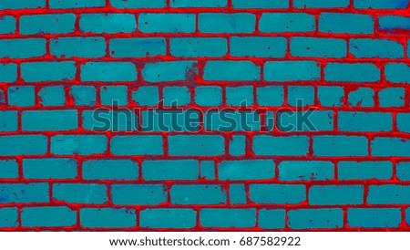 The turquoise background of red brick wall