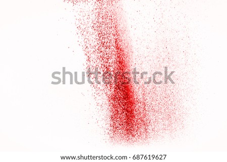 Abstract background red powder splatter on a white background