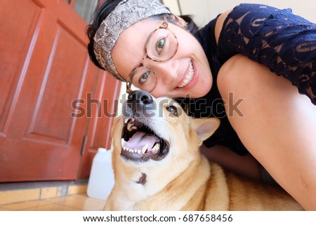 Asian woman selfie with dog
