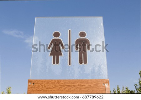 Man and woman toilet icon in nature
