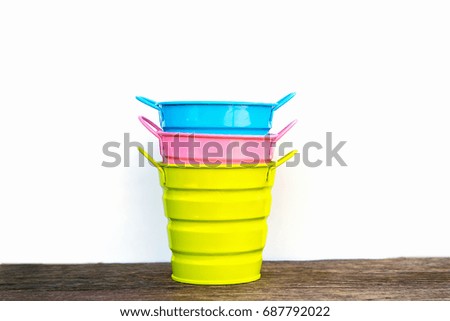 Tree Color Full Bucket On Wooden Background