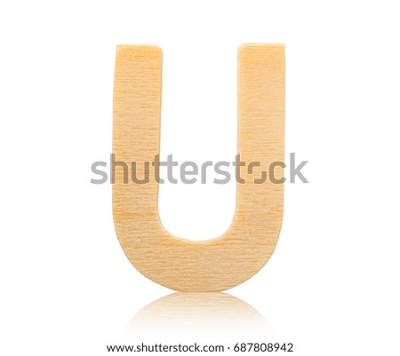 Single capital block wooden letter U isolated on white background, Save clipping path.