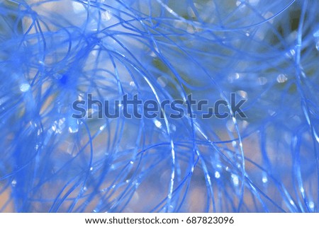 Abstract blue background. Close up of fishing line. Selective focus