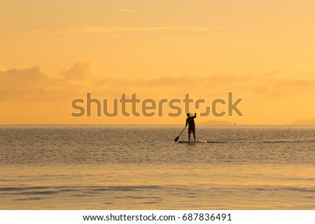 Early morning paddle boarding, Takapuna, New Zealand