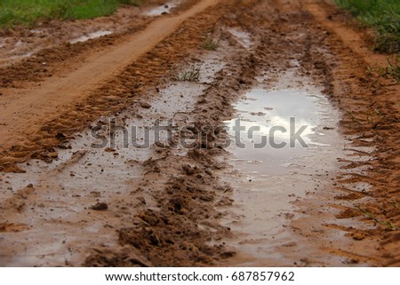 Rural roads are full of mud and water detention basins