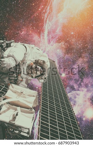 Astronaut in outer space. Spacewalk. Elements of this image furnished by NASA.