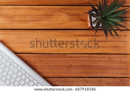 office keyboard on wood table background