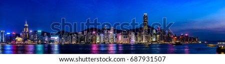 Wide panorama of Victoria Harbor night view at Hong Kong, China