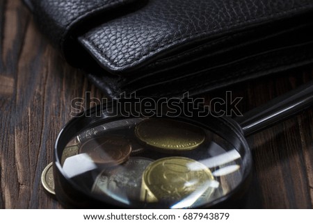 Wallet black purse men Vintage wooden background.Business concept