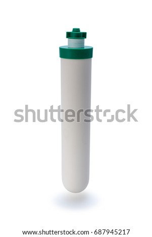 A new white ceramic water filter candle isolated on white background with effect including clipping path. Vertical Royalty-Free Stock Photo #687945217