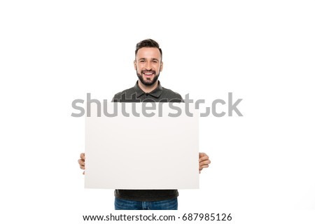 portrait of smiling man holding blank banner in hands isolated on white