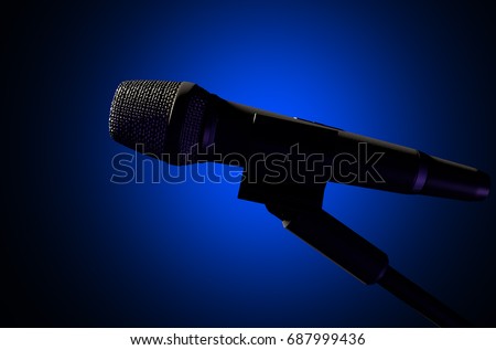 A black metal microphone on a mic stand on an isolated dark background 