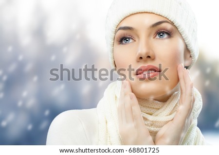 a beauty girl on the winter background Royalty-Free Stock Photo #68801725
