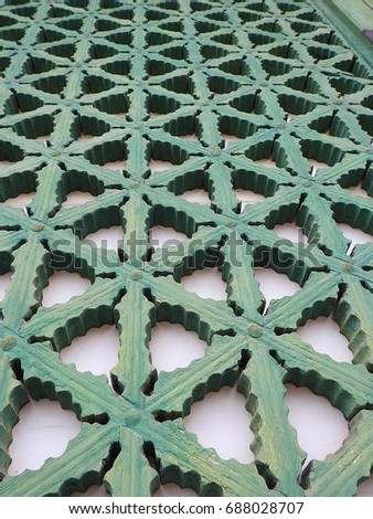 Green wood carving window screen on white background  in Korean palace