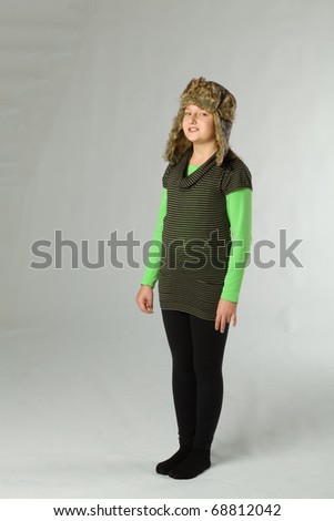 standing young girl, on white background