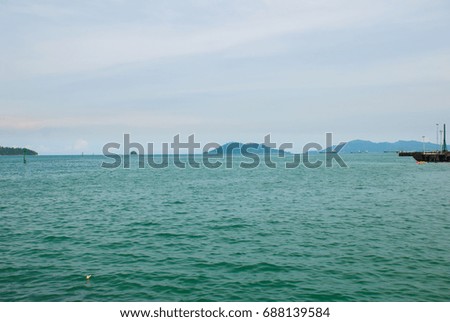 The view of the island from the waterfront. Kota Kinabalu City is the capital of the state of Sabah, located in East Malaysia.