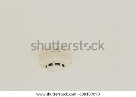 smoke detector on a ceiling.Shelter fire alarm.smoke detector of fire alarm on white ceiling at office, interiors home