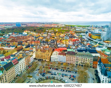 Aerial Malmo city view from above with harbour, turning Torso and North sea Royalty-Free Stock Photo #688227487