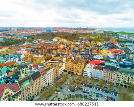 Aerial Malmo city view from above with harbour, turning Torso and North sea Royalty-Free Stock Photo #688227511