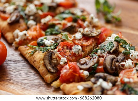 flatbread pizza  Royalty-Free Stock Photo #688262080