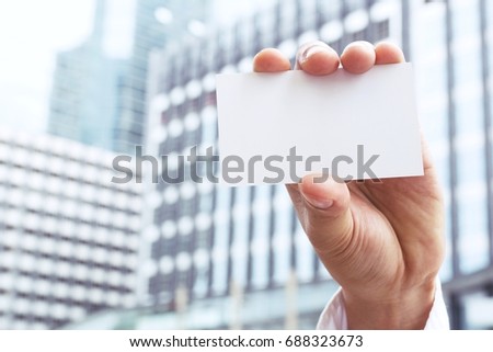 show business cards in hand businessman. 