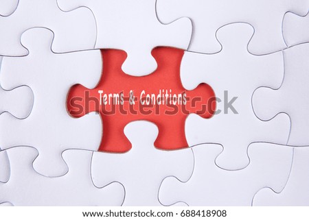 blank jigsaw puzzle with word TERMS  & CONDITIONS.