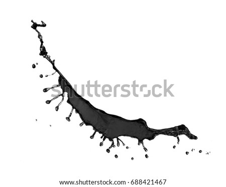 Spray of black dirty liquid close-up. The liquid is like oil.