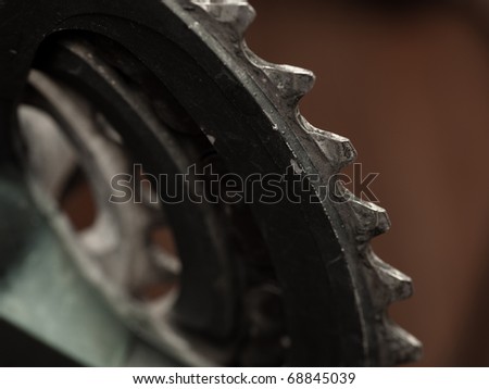 extreme closeup of a bicycle chain on blurred background