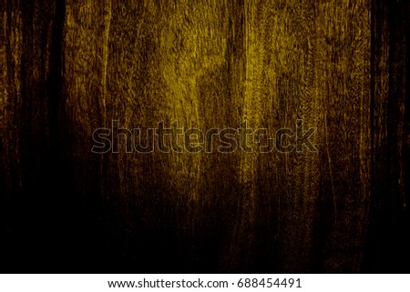 Black with yellow or gold color texture pattern abstract background can be use as wall paper screen saver brochure cover page or for presentation background also have copy space for text.
