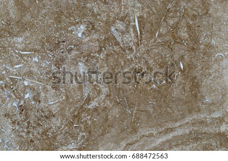 Texture marble stone brown beige closeup. Background of the marble