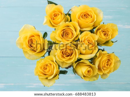 Yellow Roses Bouquet on wood background