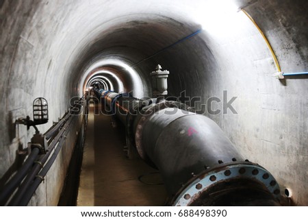 The tunnels used to divide the dams. Made of stone and spherical steel structure.