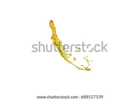 flying beautiful oil splash isolated over white background and drops