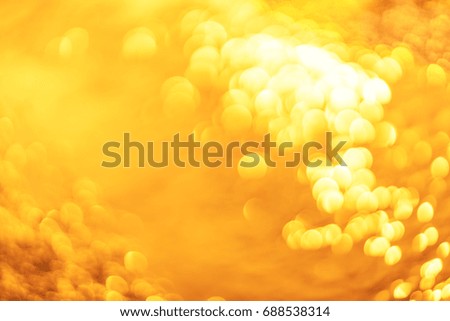 beautiful twilight soft gold background, glitter sunlight bokeh gold color filter abstract for background