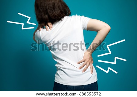 low back pain, strained back, slipped disk, medical abstract concept