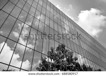 Modern building.Modern office building with facade of glass. Black and white.