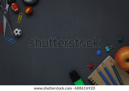 Top view accessories back to school or items desktop office desk background.Variety stationery on grunge blackboard with copy space for mock up and website.flat lay.banner.