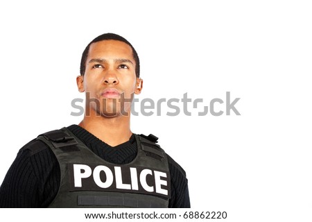 young police officer watches for trouble