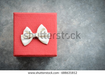 Red gift box on the floor