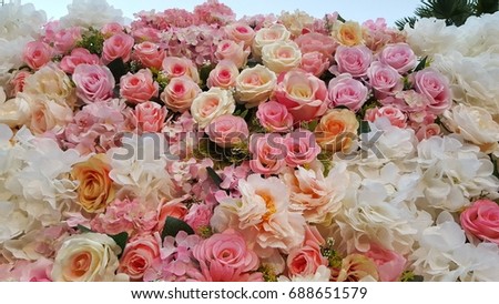 Many color of rose artificial flowers background