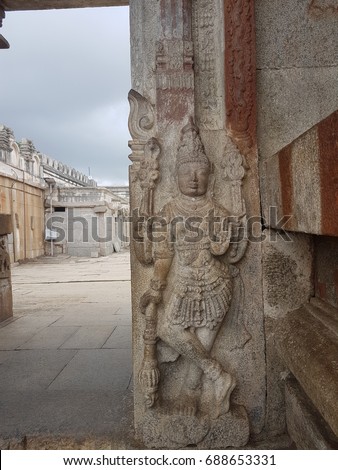 The ancient hindu craving/sculpture on the entrance wall of Jain Temple at Shravanabelagola or Gomateshwara, India.